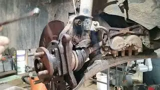 Как установить подшипники передних колес на Subaru Outback 2007 года выпуска