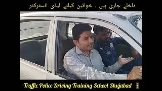 Karam Hussain khakhi adv is  learning how to drive a car.