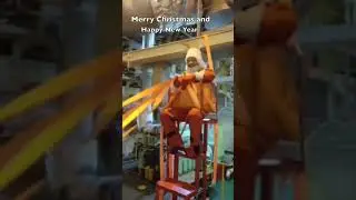 Merry christmas and Happy new year. Santa ride on two stroke Ships Main Engine.