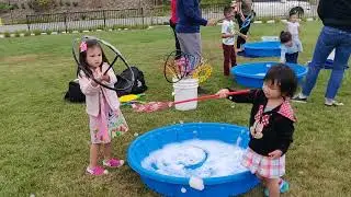 Ally and Kira make giant bubbles