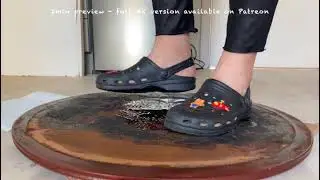 Black Crocs barefoot stuck to industrial glue that gets slowly stickier&hellip;