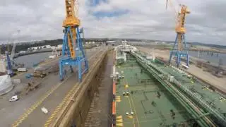 Oil tanker entering dry dock.