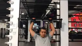 Coach Dan Isaac training on the Queenax functional training system from Precor