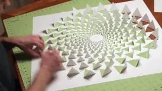 Настенное искусство в виде 3D-мандалы с оптической иллюзией, созданное с помощью одного листа бумаги