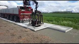 Leggen van betonplaten met vacuüm zuiger