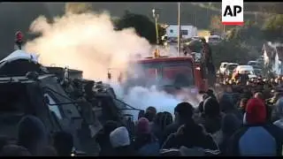 Protesting Serbs confront NATO troops at roadblocks ADDS daylight video, Dpt PM