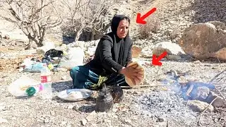 Nomadic life, cooking in nature by the spring with a nomadic woman