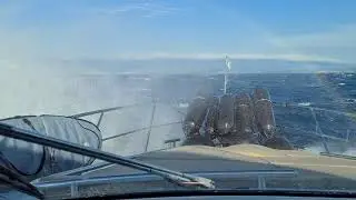 40 knots Bura and sunshine passing from Cres to Krk island Croatia. Strong wind