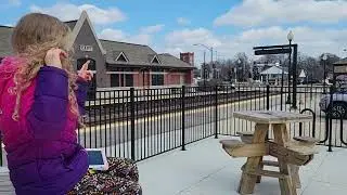 Monica is waiting for train. Autistic happy stimming