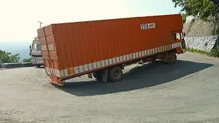 Long Size Container Lorry And Load Lorry Turning Risk Driving Ghat Road