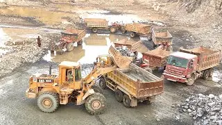 Heavy Machinery at Work: Mountain Rock Loading Operation | Caterpillar Loading Rocks into Trolleys 