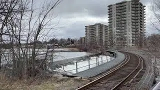 CPR crossing the Speed River in Cambridge with Autoracks for Toyota. April 1/2021
