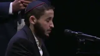 Leibel Lazaroff performs at the Sydney Opera House at the Light Will Win Shloshim Event