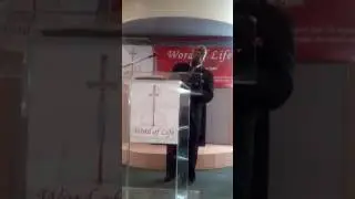 Bishop Darrell Williams preaching, 