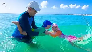 A lot of fun on the beach with parents