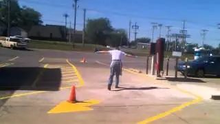Small aircraft lands in parking lot