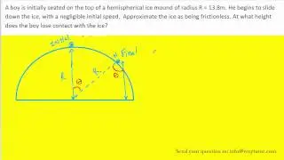 A boy is initially seated on the top of a hemispherical ice mound of radius R = 13.8m. He begins to