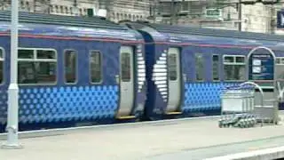 New Liveried 156433 Departs Glasgow Central