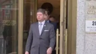 Bank CEO denies bribery in bid for Trump post