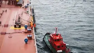 A pilot boat docks on the chemical tanker ship Free Footage by Hakee