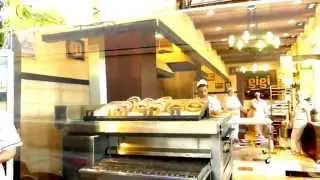 Street food in Bucharest Romania-eating covrigi at Gigi's