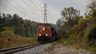 CN O490 at Silverbell Road (Lake Orion,MI) with CN 5616 leading. 