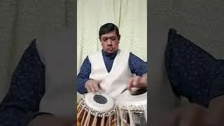 Tabla solo in teentaal by  Pandit Kishore Banerjee. 