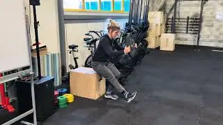 Weighted one leg box squat