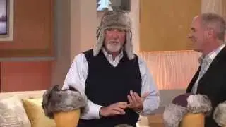 Trapper Hat with Ear Flaps in Faux Fur Trim with Dan Hughes