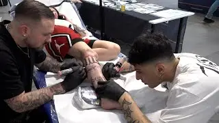 Lucca Tattoo Expo baciata dal sole, tatuaggi in bella mostra