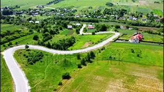 Aerial drone view of a flying over the rural landscape.