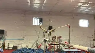 WAG - UB - Clear hip circle forward to &frac12; turn and straddle backwards over the bar (Weiler Khorkina)