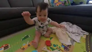 Winston plays in front of TV