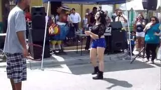 Half Head man Carlos Rodriguez and Girl dancing at Calle 8 2012