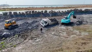 Amazing Bulldozer Clearing Stone and Mud to an Even Height and Dump Truck Transport Stone in Process