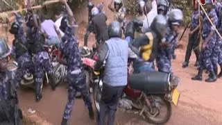 Rugunda asked to explain Police brutality towards Besigye supporters