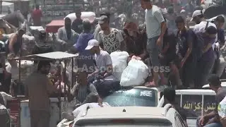 Israeli forces accused of firing towards crowds going to food distribution point in Gaza