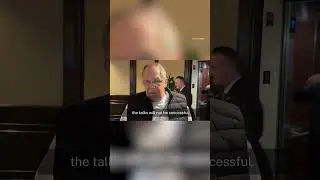 Russia's official arrives in Alaska wearing Soviet shirt before meeting Trump for peace talks