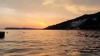 Timelapse of a sunset on Uvala Lapad Beach, in Dubrovnik, Croatia