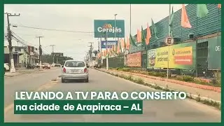 Levando a TV para o conserto, na cidade de Arapiraca – AL