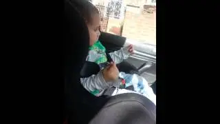 Little afro bopping to the music