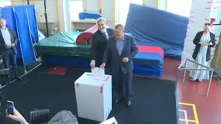 Denmark Prime Minister Lars Lokke Rasmussen casts his vote in general election | AFP