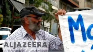 Indebted Greeks wary of losing homes