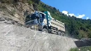 Truck at high altitude challenging mountain road