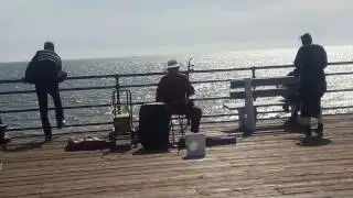Santa Monica pier: Chinese Guy Playing Beautiful Melody
