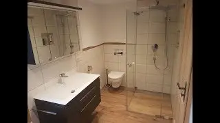 Badumbau mit bodengleicher Dusche und Glas Duschkabine