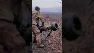 Ukrainian Soldier Destroys A Russian Vehicle With A FGM-148 Javelin Mounted On A Kornet Tripod