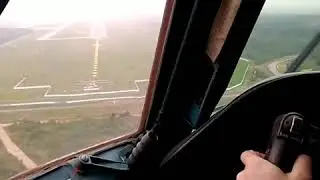 An 74 Motor Sich посадкаиз кабины в дождь. Аэропорт Минск.