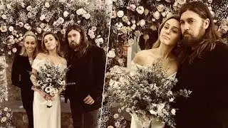 Miley Cyrus looks elegant in gorgeous wedding portrait as she poses with parents