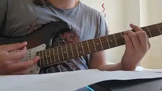A simple, light punk rock riff with a distortion effect.